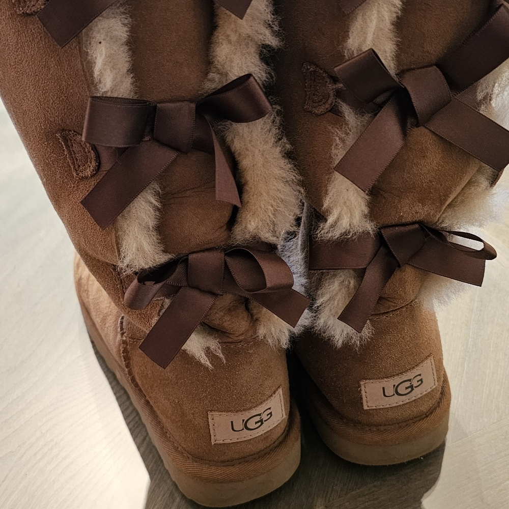 UGG women size 7 Tall boots brown beige color